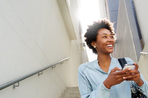 Smiling woman on phone